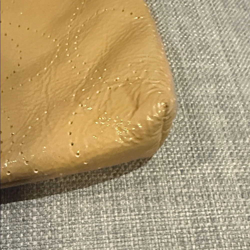 Coach Perforated Signature Gold Leather Wristlet